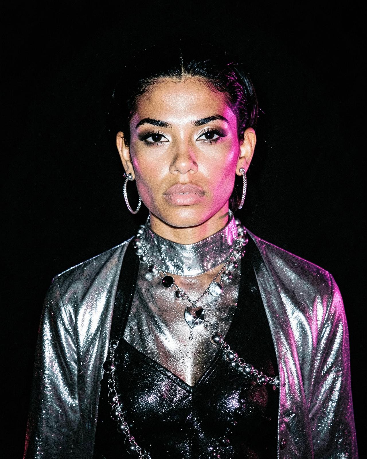 Editorial portrait of a model in sculptural avant-garde clothing